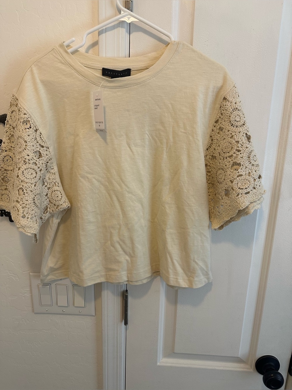 Ladies blouse by Sanctuary ivory with eyelet style sleeves Size Medium NWT